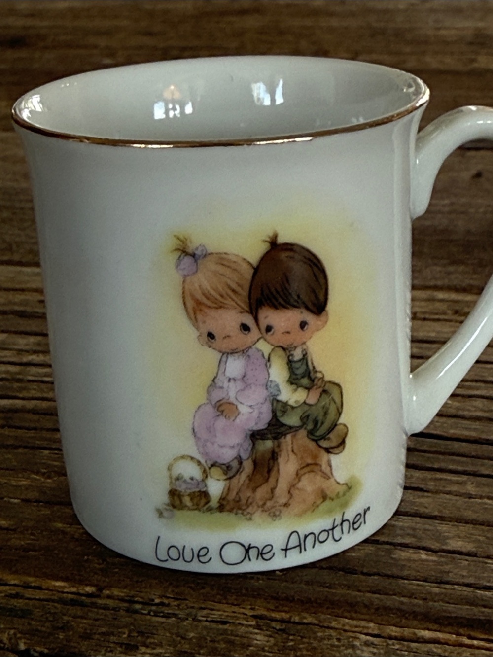 Precious Moments White Mug with Pastel Figurine Illustration and Gold Trim 1978